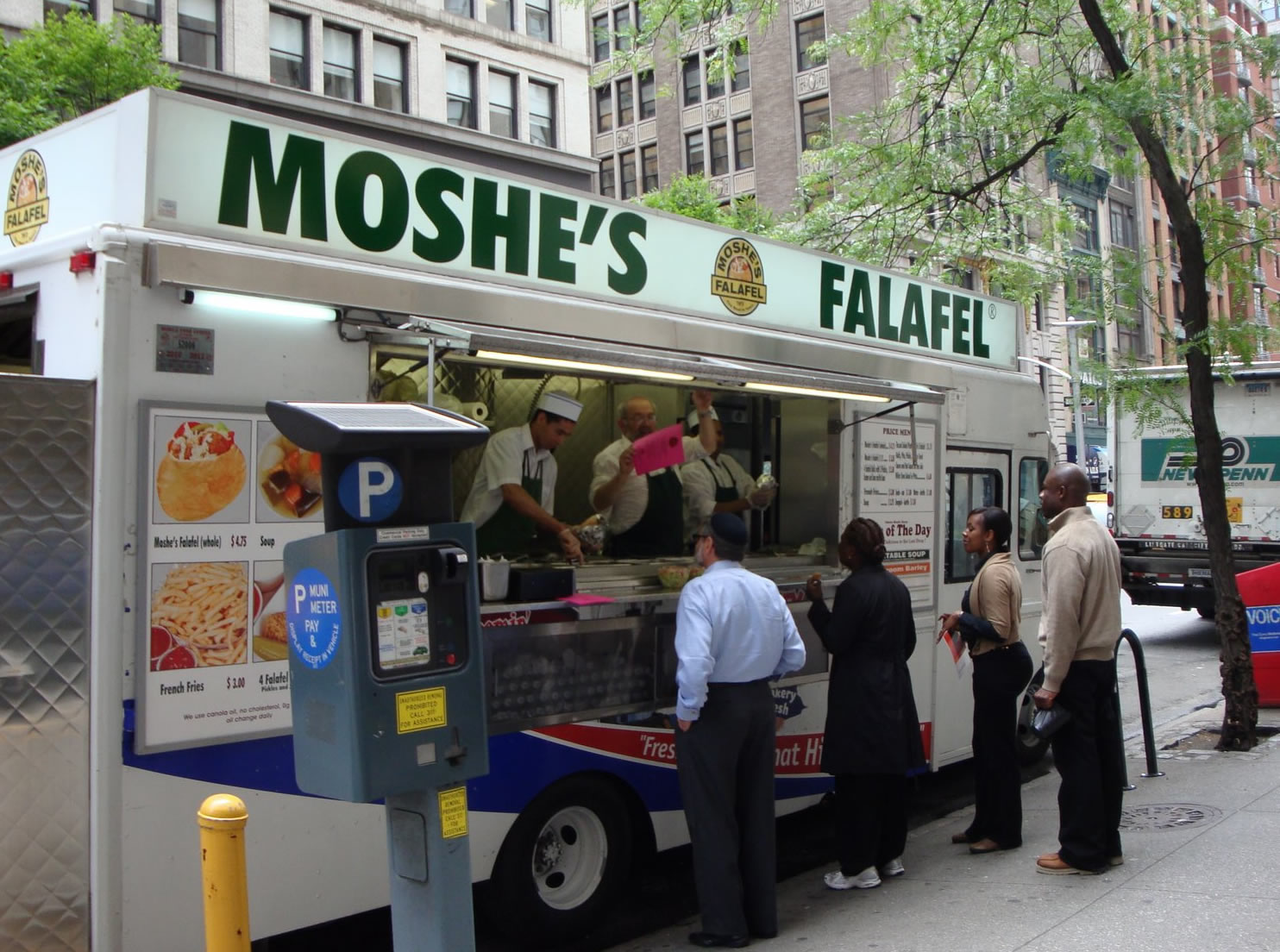 Moche's Falafel truck in street